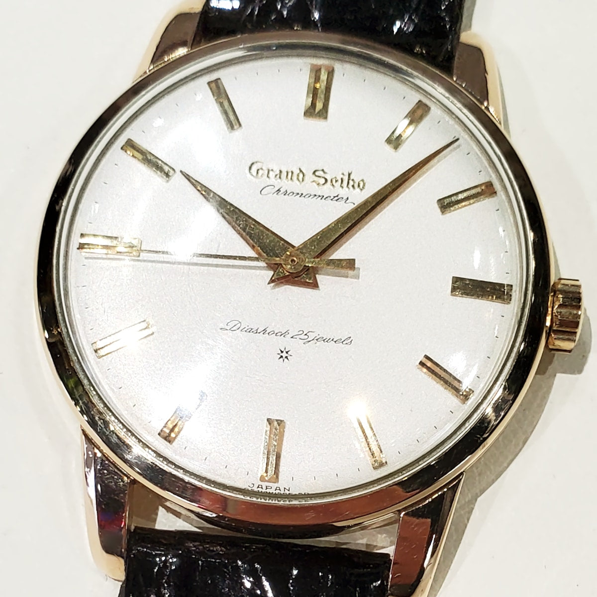Grand Seiko First Model J14070, 14K gold-filled, original crown and buckle, manual-wind, serviced, manufactured in 1963 (Showa 38).