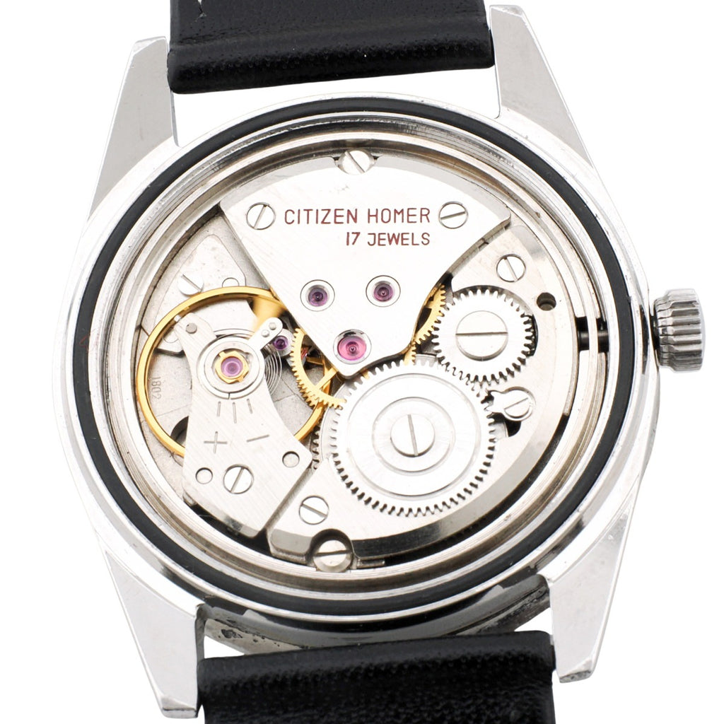 Citizen Homer Date I-51207a, engine-turned bezel, Cupid medallion, manual-wind, serviced, 1960s