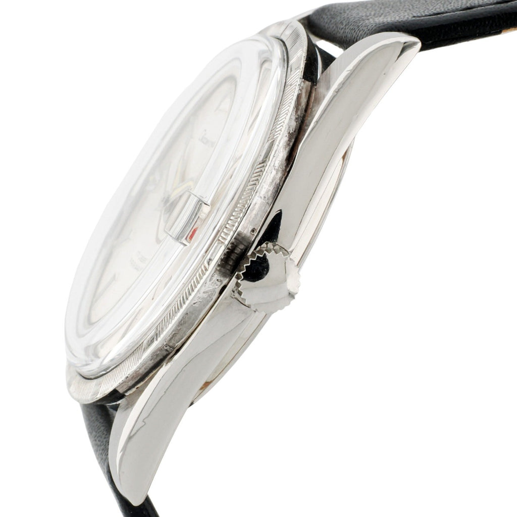 Citizen Homer Date I-51207a, engine-turned bezel, Cupid medallion, manual-wind, serviced, 1960s